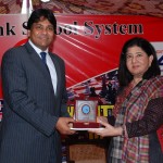 The Chief Guest Mr. Hanif Qureshi, receiving a sourvenier from Dr. Salma Mian, Managing Director LSS.
