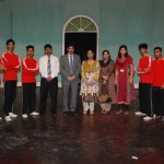 A group photograph of the Alhamra Town Campus performers with the Chief Guest, Prof. Dr. Muhammad Arif Khan.